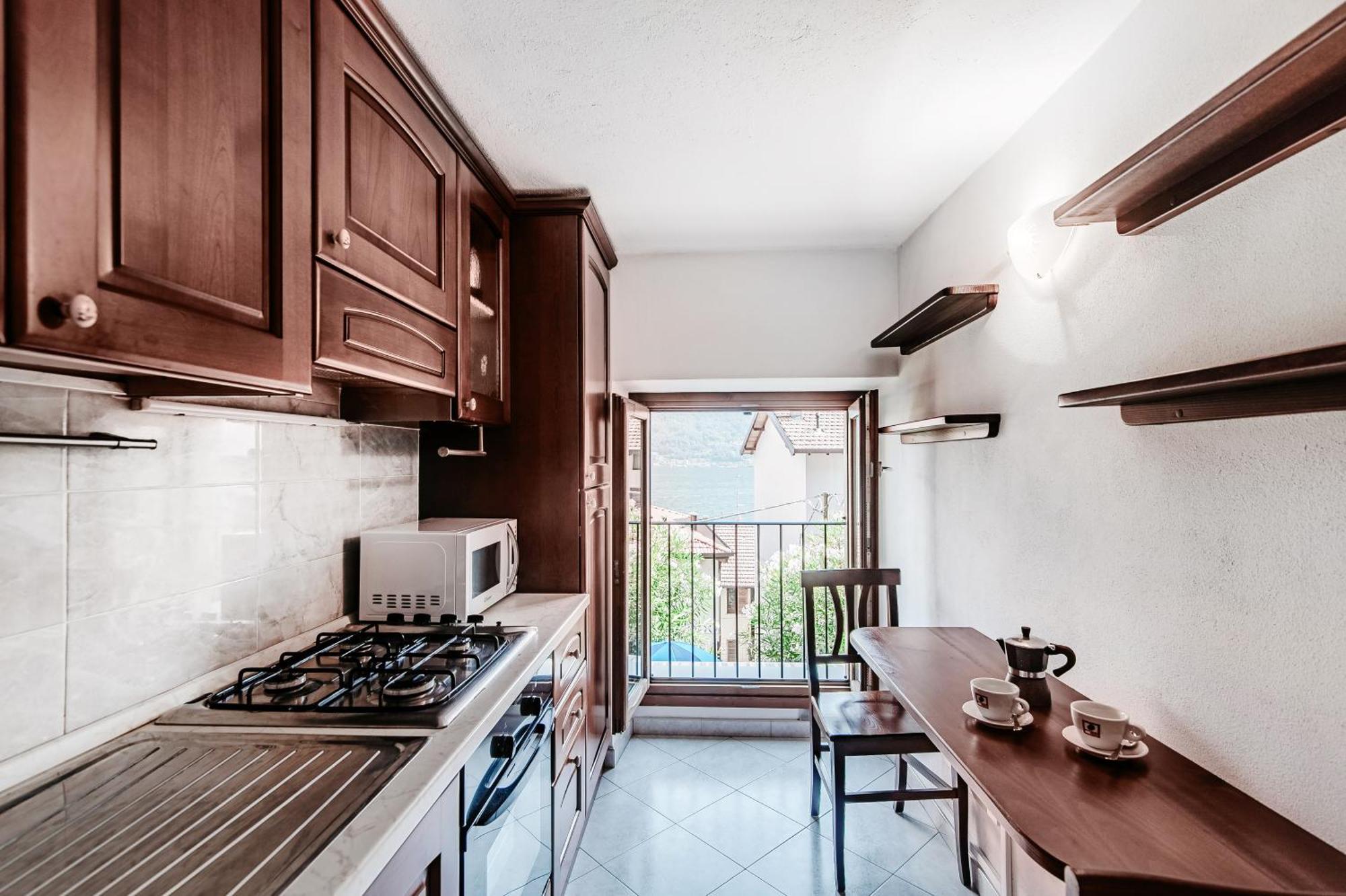 Delizioso Bilocale Vista Lago Colonno Luaran gambar